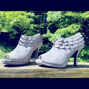 Rampage-gray ankle bootie 9.5 worn once. ruffle, zippered back